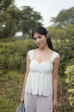 Load image into Gallery viewer, KIARA TEXTURED RUCHED SLEEVELESS TOP IN WHITE
