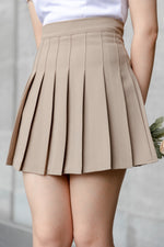 Load image into Gallery viewer, DORA PLEATED SKORTS IN BROWN
