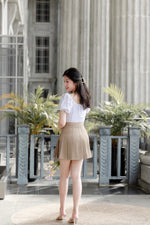 Load image into Gallery viewer, DORA PLEATED SKORTS IN BROWN
