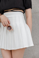 Load image into Gallery viewer, DORA PLEATED SKORTS IN WHITE
