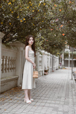 Load image into Gallery viewer, VICKY RUCHED MIDI DRESS IN BEIGE
