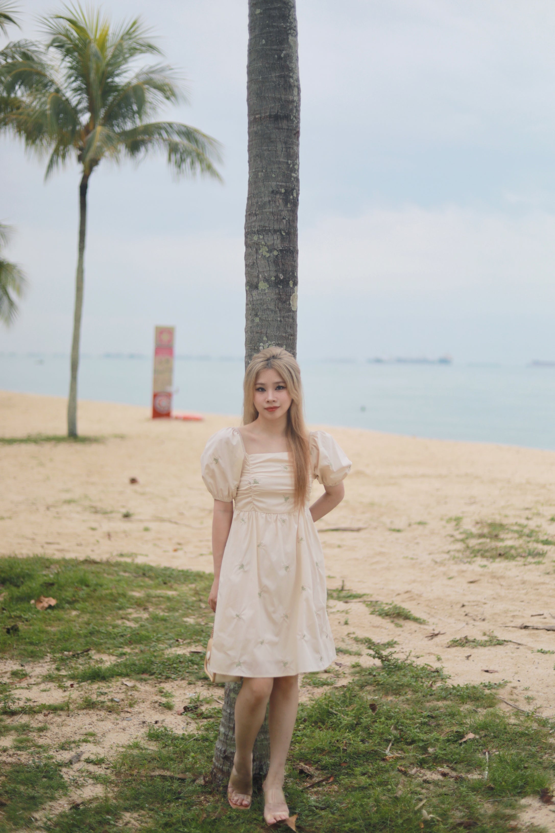 ADELINE RUCHED BABYDOLL DRESS IN CREAM