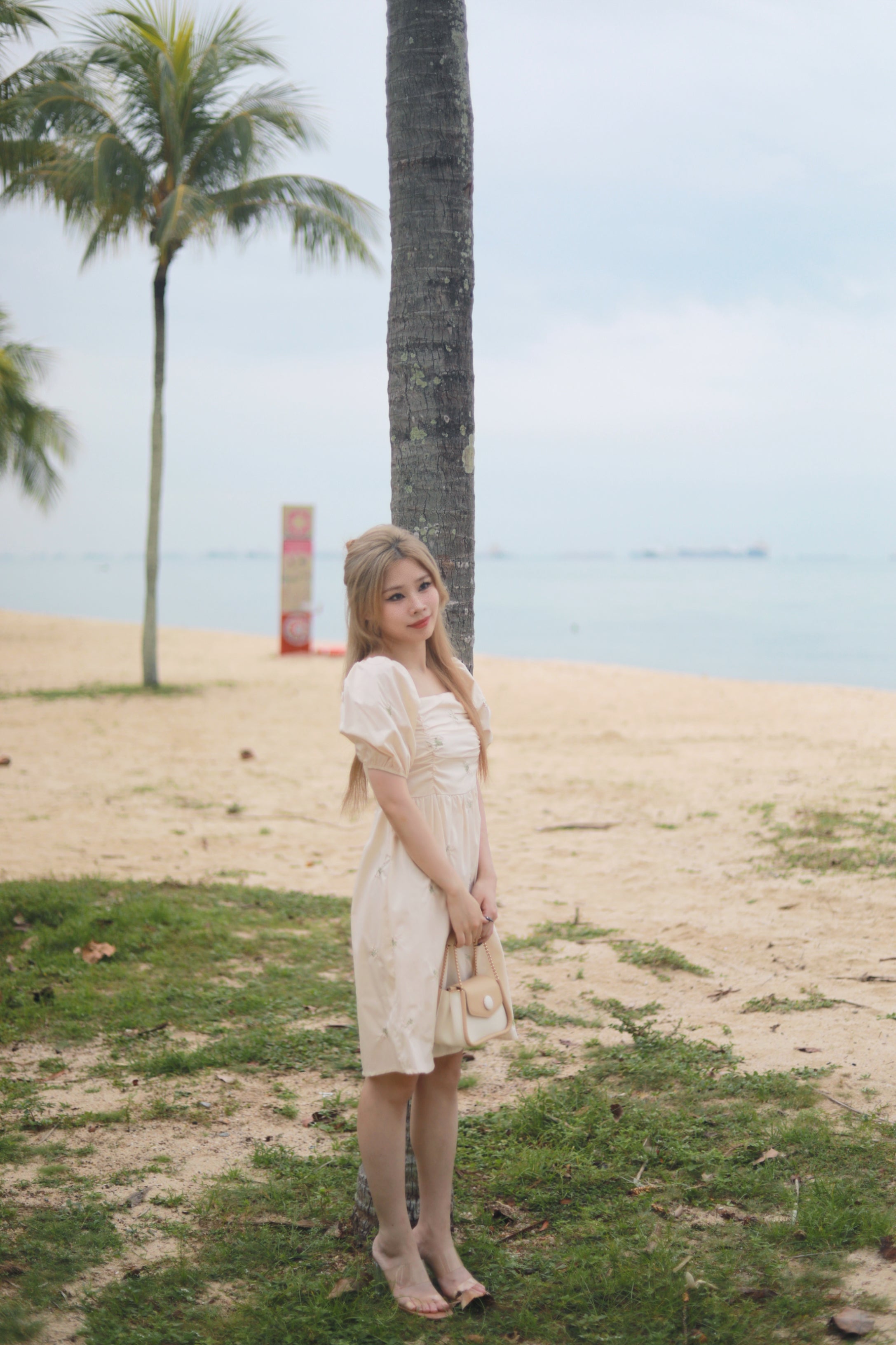 ADELINE RUCHED BABYDOLL DRESS IN CREAM