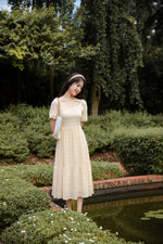 Load image into Gallery viewer, BERENICE TEXTURED PUFF SLEEVE MIDI DRESS IN CREAM
