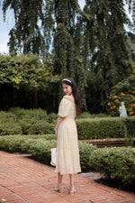 Load image into Gallery viewer, BERENICE TEXTURED PUFF SLEEVE MIDI DRESS IN CREAM
