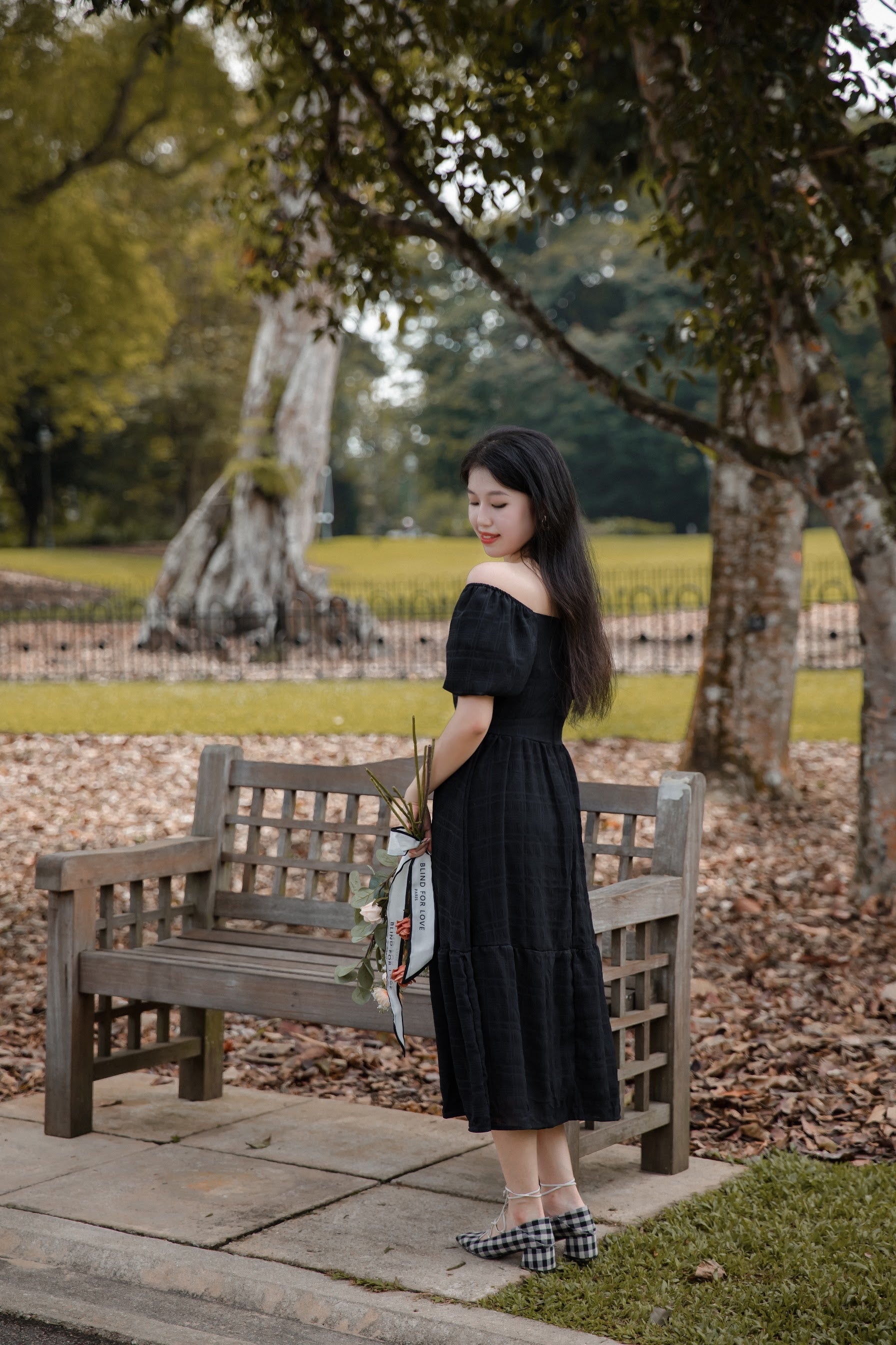 BERENICE TEXTURED PUFF SLEEVE MIDI DRESS IN BLACK